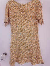 Very pretty Faithfull the Brand floral print Daphne dress yellow. Size M 10-12