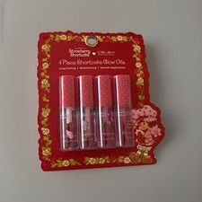 Strawberry Shortcake 4-Piece Shortcake Glow Oils Flavored Lip Gloss Set new