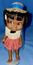 Dakin Dream Dolls. African American girl with hat and stand. 7 1/2"