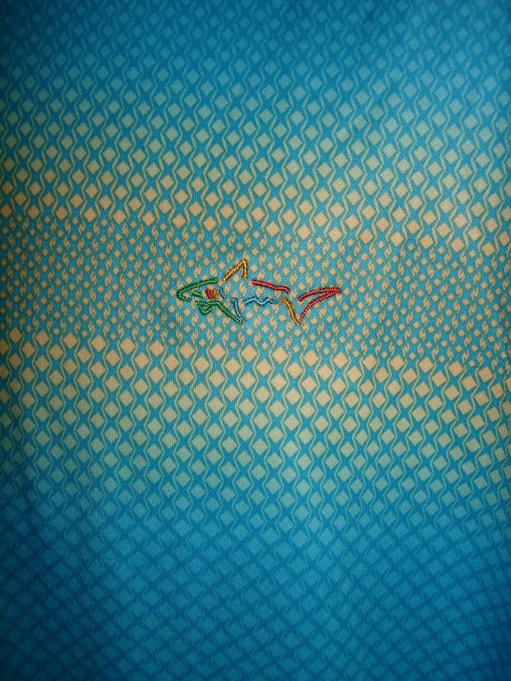 NEW GREG NORMAN 2-TONE BLUE/YELLOW GEO DESIGN 100% POLY S/S POLO SHIRT L NO LOGO - Image 3 of 4