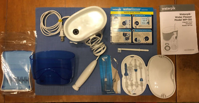 WATER PIK MODEL WP-130W WATER FLOSSER: EXCELLENT SHAPE & LOOKING FOR A GOOD HOME