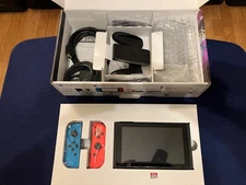 Nintendo Switch - Blue & Red Joy-Con + 128GB Sandisk Micro SD card