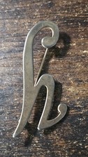 Silver tone cursive "h" letter vintage Logo pin