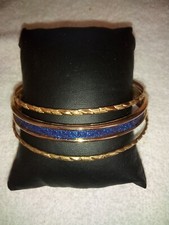 Gold Tone Bangle Bracelet with Glittery Blue Center  2 Shiny Gold Tone Bangles