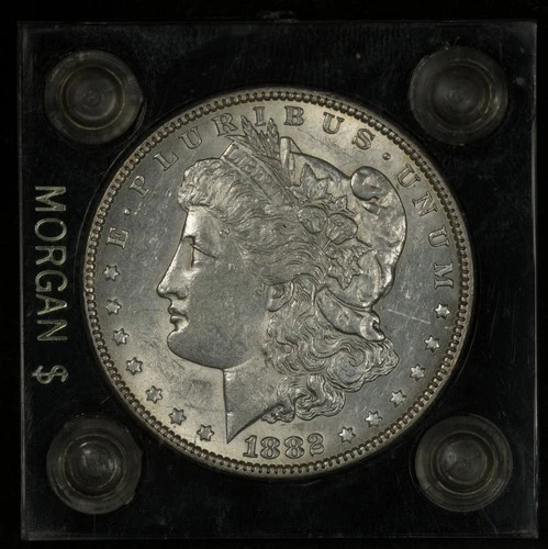1882 MORGAN SILVER DOLLAR LUSTROUS AU IN "MORGAN $" CAPITAL PLASTICS HOLDER #1