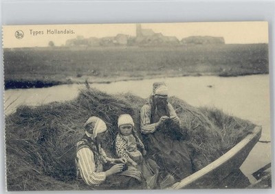 12034032 - Types from Holland - Children in Costume Knitting on a Barge with