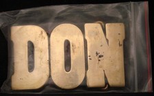 LF22125  NOS  VINTAGE 1970s/80s CUT-OUT NAME  DON  SOLID BRASS BUCKLE