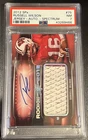2012 UD SPX RUSSELL WILSON JERSEY AUTO SPECTRUM #75 5/25 PSA 7