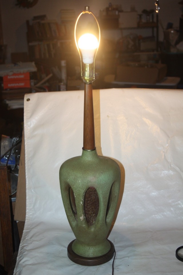 A rare PLASTO Mfg. Co. lamp — plaster body meets teak wood at 36 inches tall, a named-maker vintage piece with real collector cred.