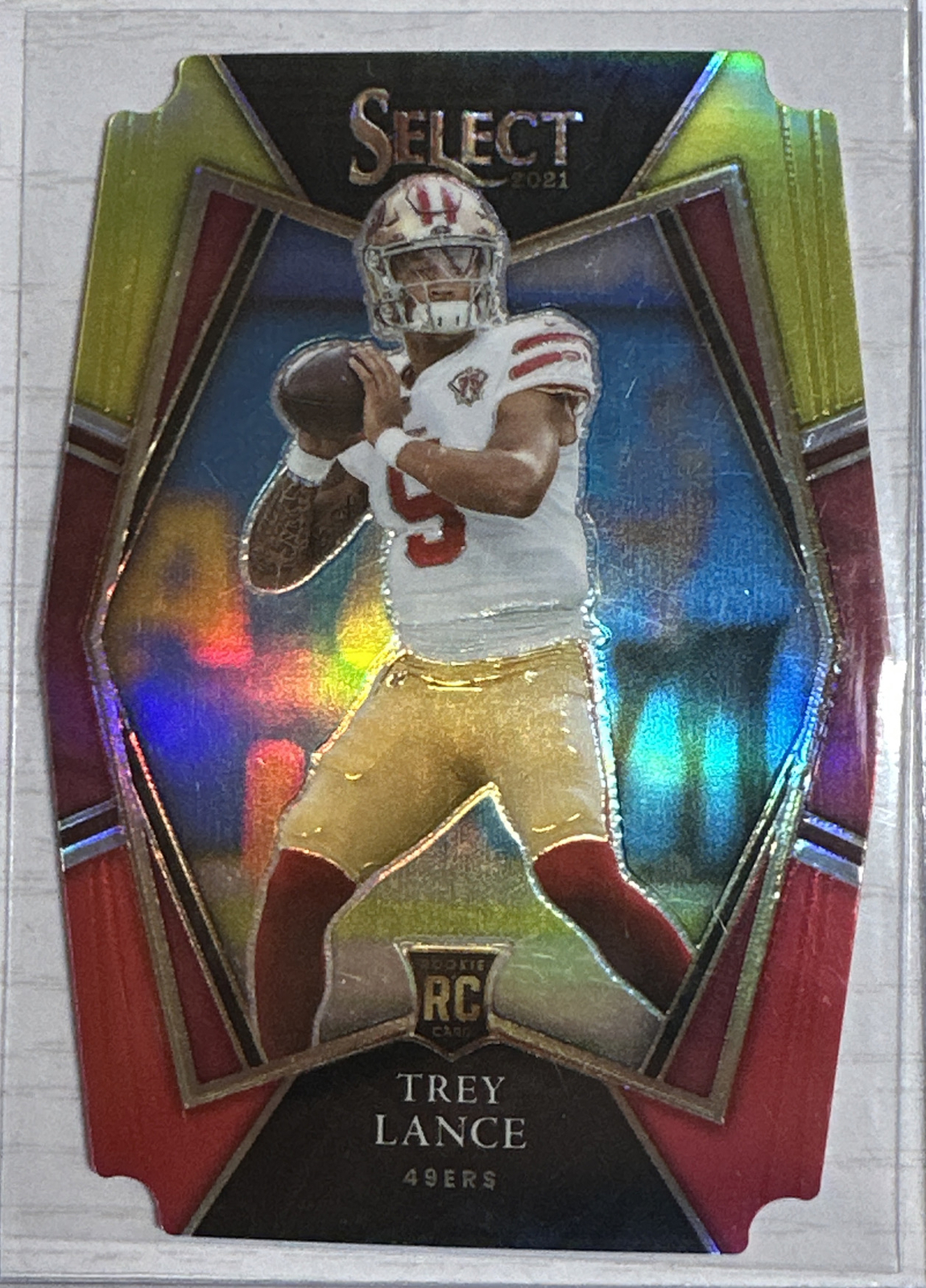 2021 Panini Select #145 Trey Lance Premier Level Red and Yellow Prizm Die-Cut