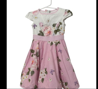 Charming Monnalisa kids dress featuring a delightful pink floral design.