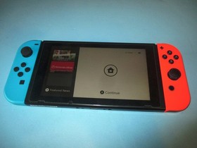 Nintendo Switch System Console w/Neon Red & Blue Joy-Cons + Dock & Extras
