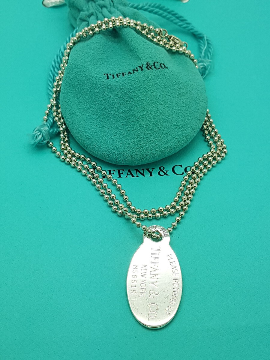 Return To Tiffany & Co. Silver Oval Tag Beaded 34