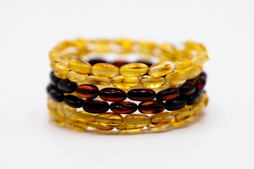 Baltic Amber Bracelet Rainbow on Wire with Olive-shaped Baltic Amber Beads