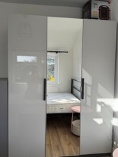 IKEA PAX Wardrobe with a Mirrored Door on Hinges