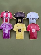 Lincoln City 2026-27 Season kit and Train Wear Pin Badges