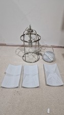 Industrial Pendant Light Is A Brushed Nickel Fixtures In A Metal Cage Design
