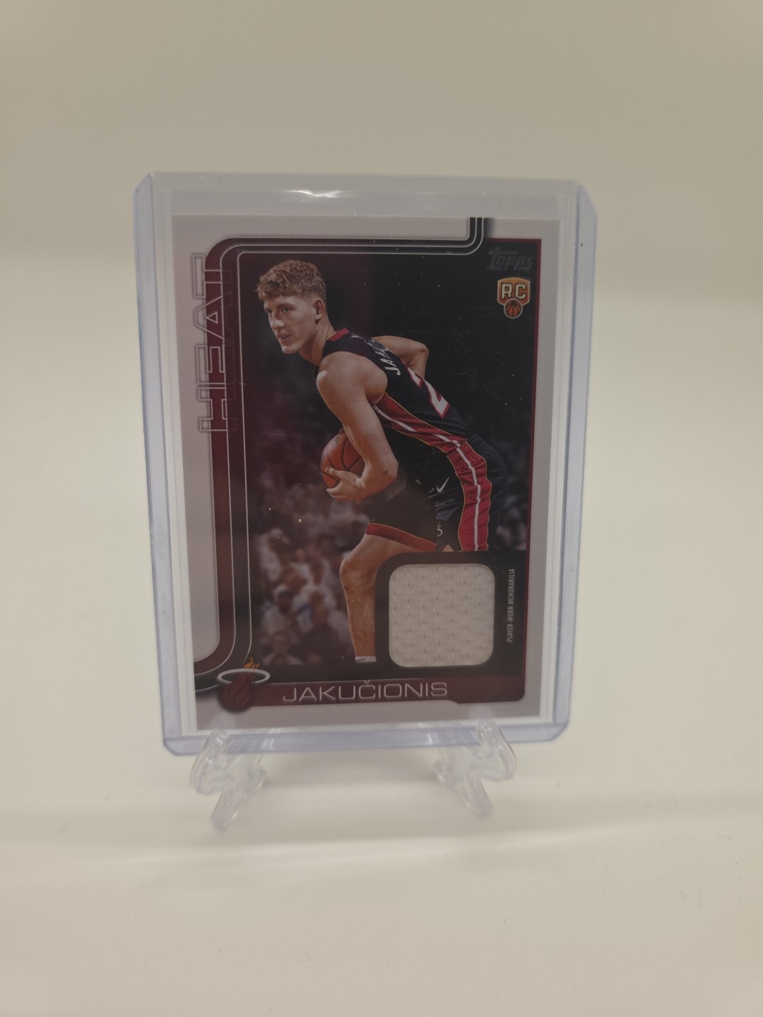 2025-26 Topps - Flagship Real One Relics Kasparas Jakucionis #FRO-KJ (MEM, RC)