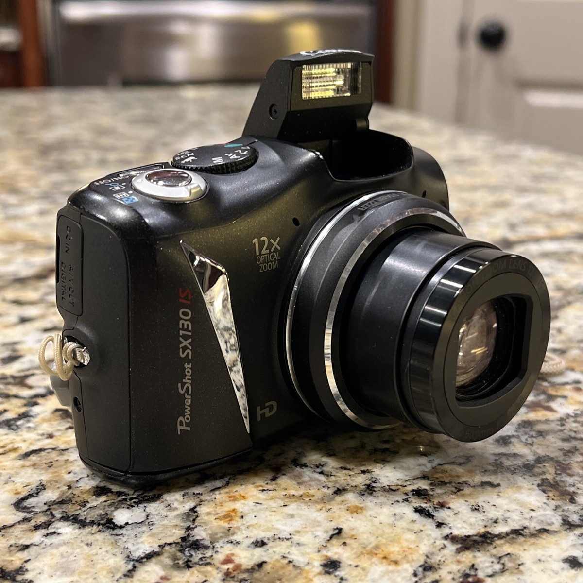 Canon PowerShot SX130 IS Digital Camera 12.1MP 28mm wide 12x