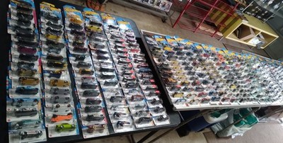 50-RANDOM HOT WHEELS MYSTERY BOX-NO DUPLICATES PLUS ONE REGULAR TREASURE HUNT!!!