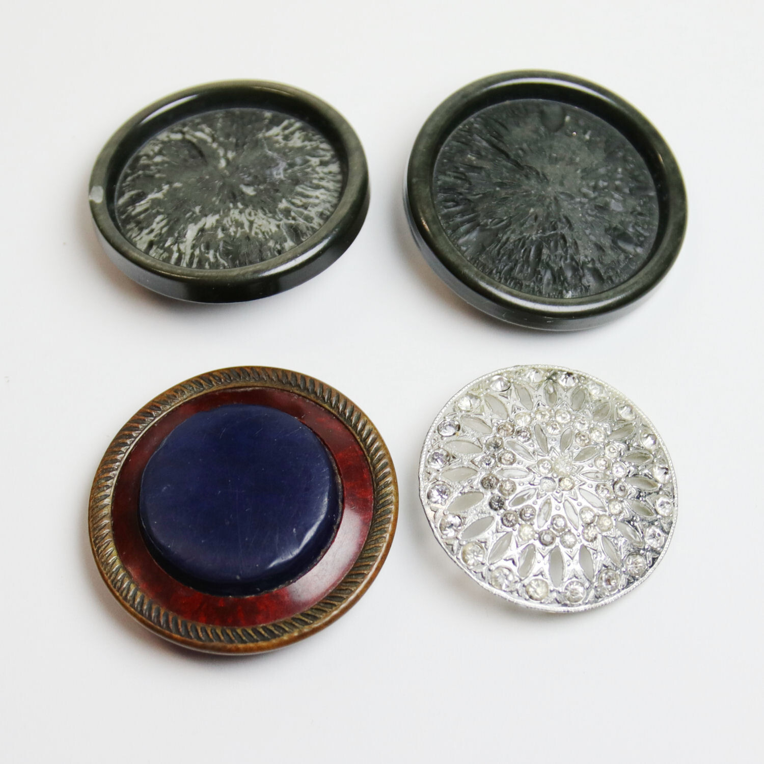 4 Vintage Buttons, 2 Textured, 1 Rhinestone, 1 Celluloid. Round Shank & Tunnel