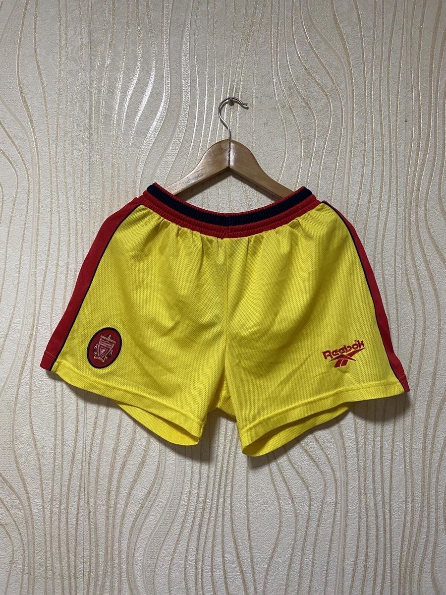 Shorts reebok best sale homme jaune