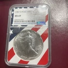 1987 Silver American Eagle NGC MS-69. Beautiful. No Milk Spots. Flag Label