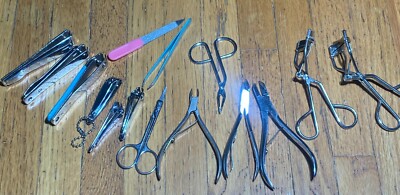 15 piece ot of nail clippers cutters and eyelash curlers nail file