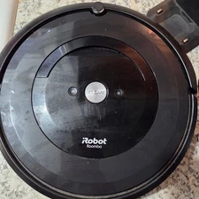 IRobot Roomba E5 robotic vacuum Comes on Charging issues Needs Battery PARTS
