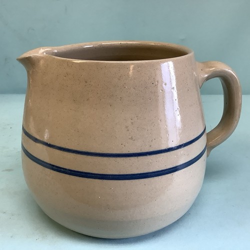 Stoneware Pitcher 5 1/2”H 7 1/2” Spout to Handle