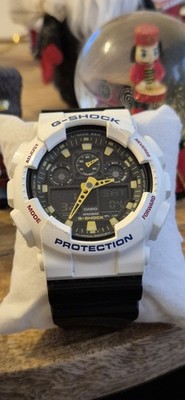 Casio G-Shock GA-100CS Herren Armbanduhr Weiße- Schwarz