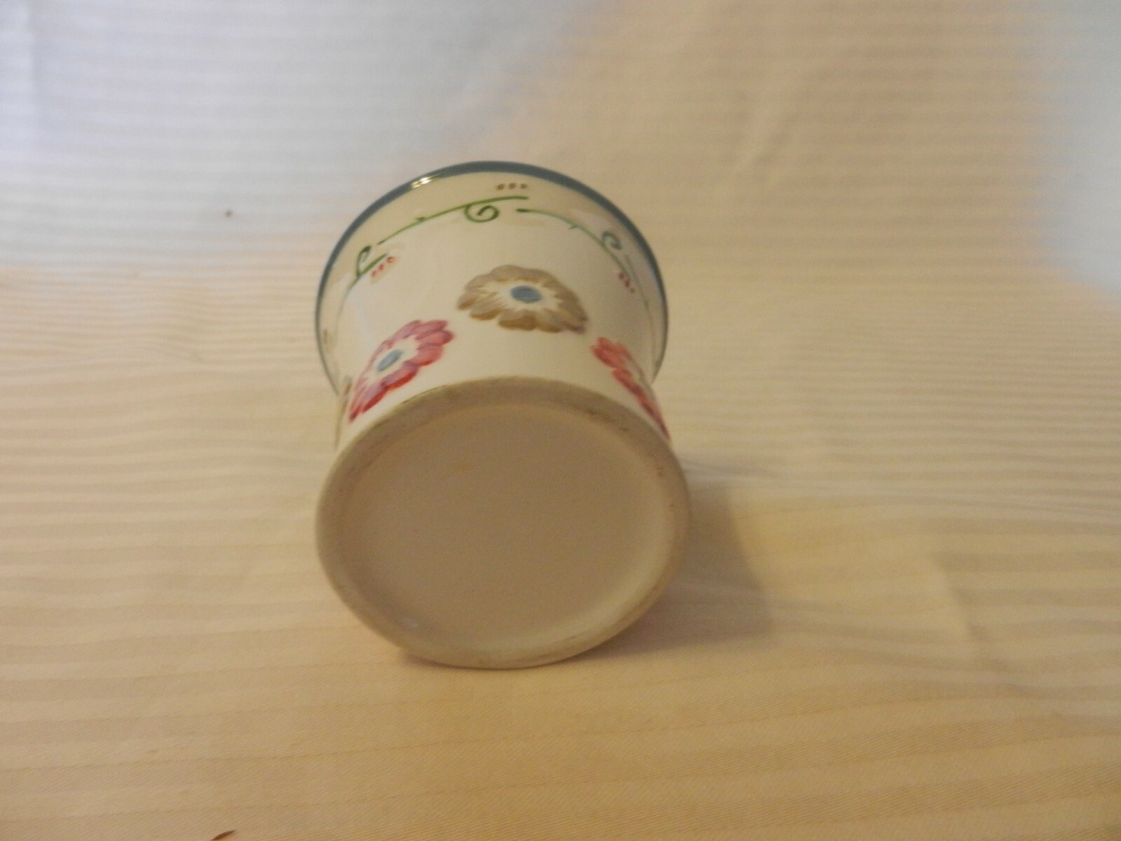 White Ceramic Votive Candle Holder with Multi Colored Embossed Flowers