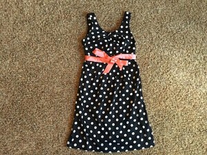 orange and white polka dot dress