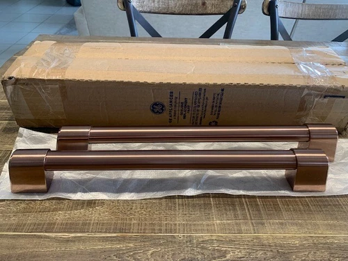 NEW OEM GE BRUSHED COPPER RANGE HANDLES WB15X33784 SET OF 2 OPEN BOX
