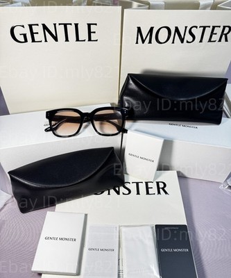 GentleMonster Una.C N 01(OR) Sunglasses Black Frame Orange Lenses