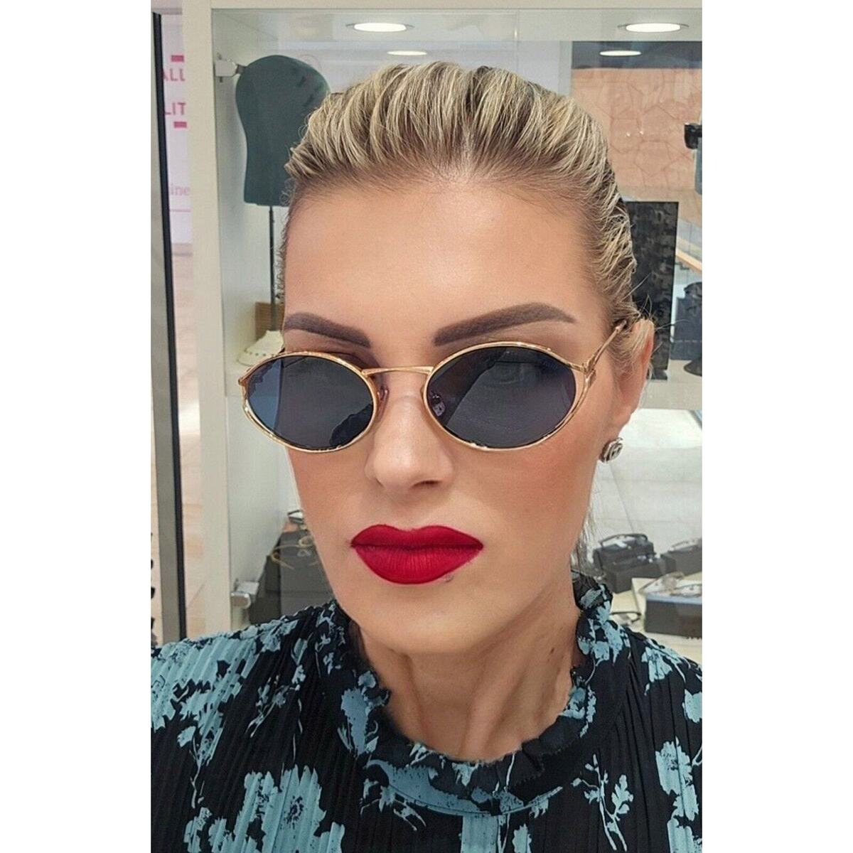MIU MIU オハルフレムサンクラス MU52YS ZVF1V1 MIU MIU MU 52YS ZVF1V1 Rose Gold Havana Blue Lens Women