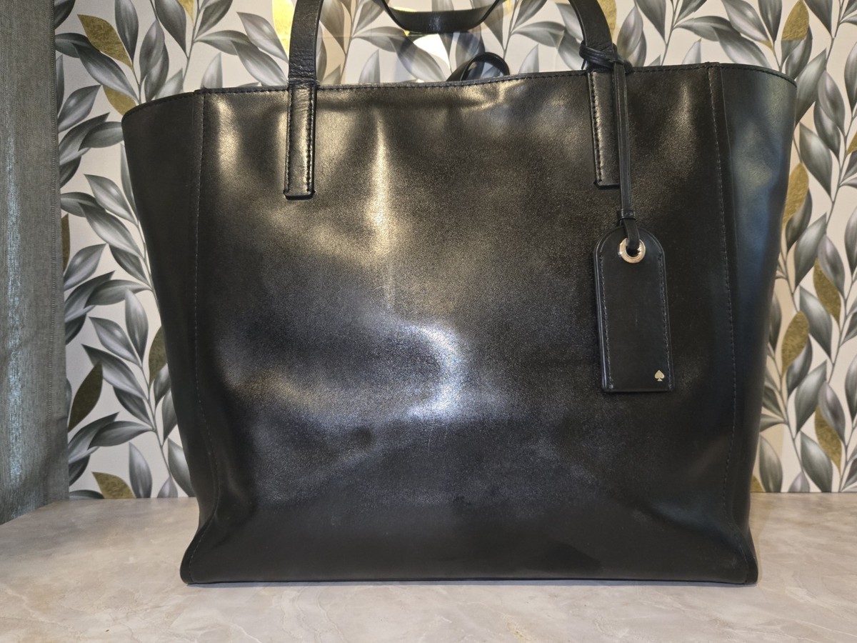 kate spade black logo-lined handbag interior with gold foil badge Kat Sanders | Kate Spade Black Crossbody Bag With Gold  main image 2