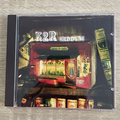 K2R Riddim | Roots Book | CD | Sehr guter Zustand