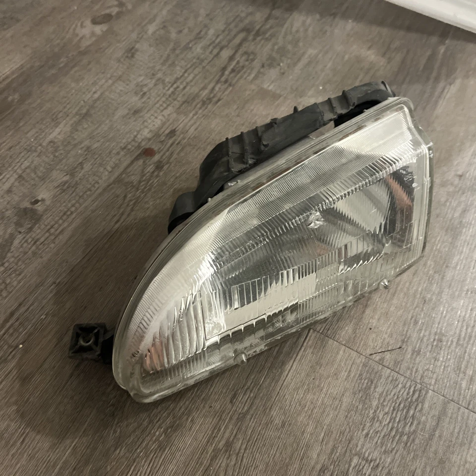 JUEGO DE FAROS DE CRISTAL HONDA CIVIC 1992-1995 OEM (uno con pestañas rotas) Foto 2 de 4