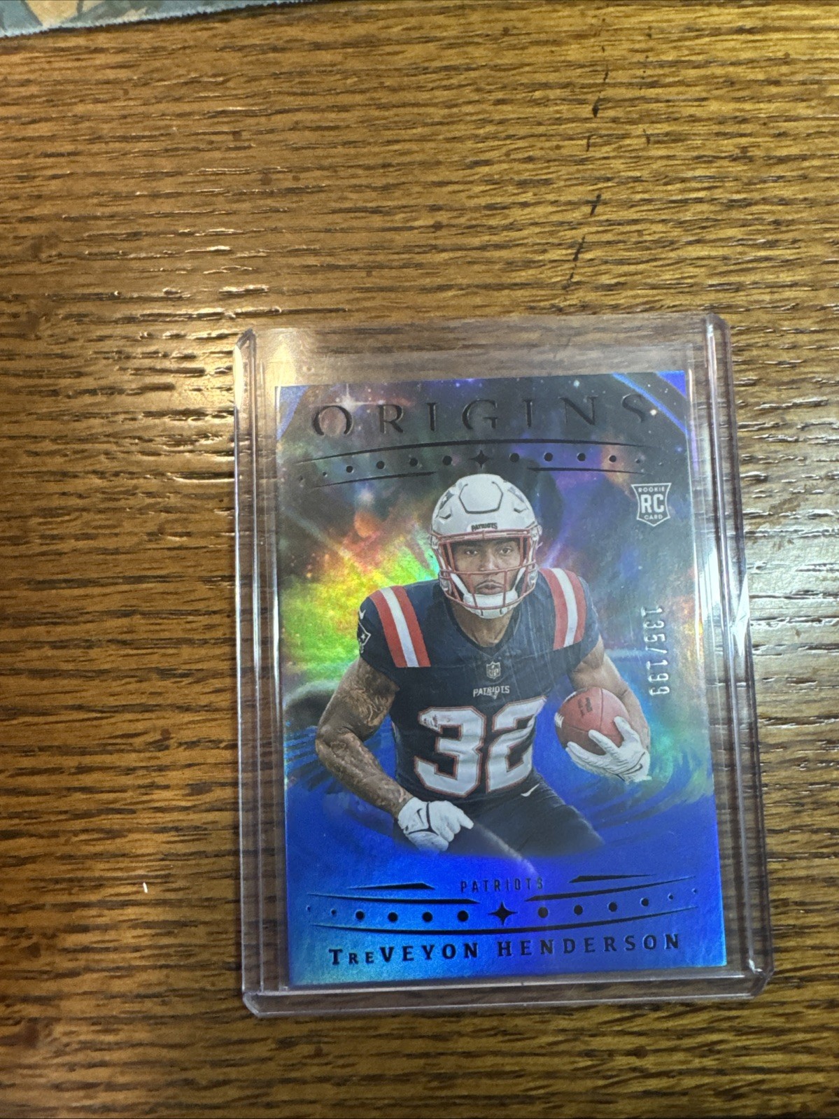 2025 Panini Origins - Rookies TreVeyon Henderson,  #105 Blue /199 (RC)