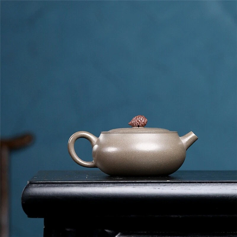 Tetera hecha a mano en venta marcada real Yixing Zisha bola de arcilla en forma de agujero infusor Foto 3 de 4