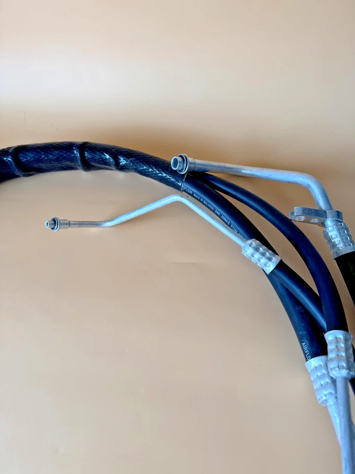 Manguera refrigerante aire acondicionado Chrysler Town & Country Grand Caravan 3,6 L 05005204AC Foto 4 de 4