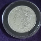 1900-P Morgan Silver Dollar $1 BU/AU IN CAPSULE