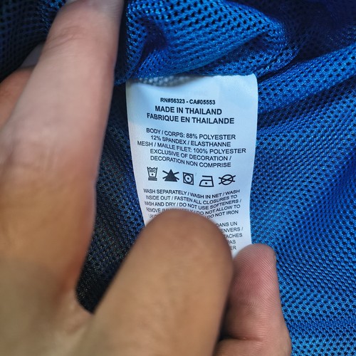 White Nike Project FROG Bubble Mesh Spellout hoodie in blue and raisin colorway, with printed inner label text and care instructions.