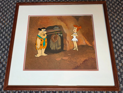1970s FLINTSTONES PRODUCTION CEL FRED & WILMA - ORIGINAL HAND PAINTED BACKGROUND