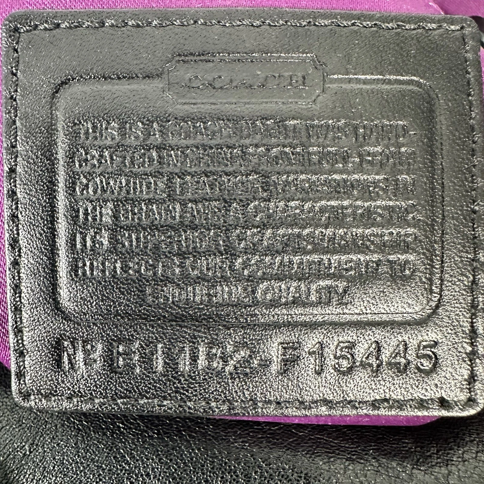 Borsa a tracolla Coach Ashley in pelle nera viola raso con zip superiore F15445 usata in ottime condizioni