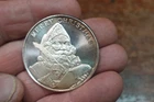 2004 MERRY CHRISTMAS SANTA PEACE ON EARTH 1 OZ SILVER ROUND 999