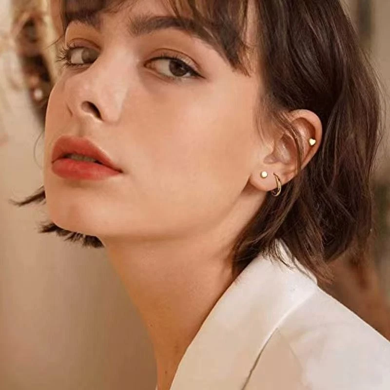 19 pares de aretes de acero quirúrgico aro de circonita espalda plana pequeño perno perforador oreja Foto 2 de 4