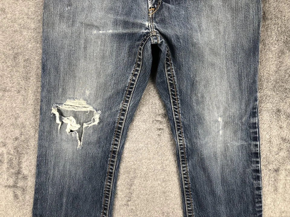 Ariat FR M4 Low Rise Boot Jeans Mens 33x36 Blue Distressed Flame Resistant Denim - Image 3 of 4