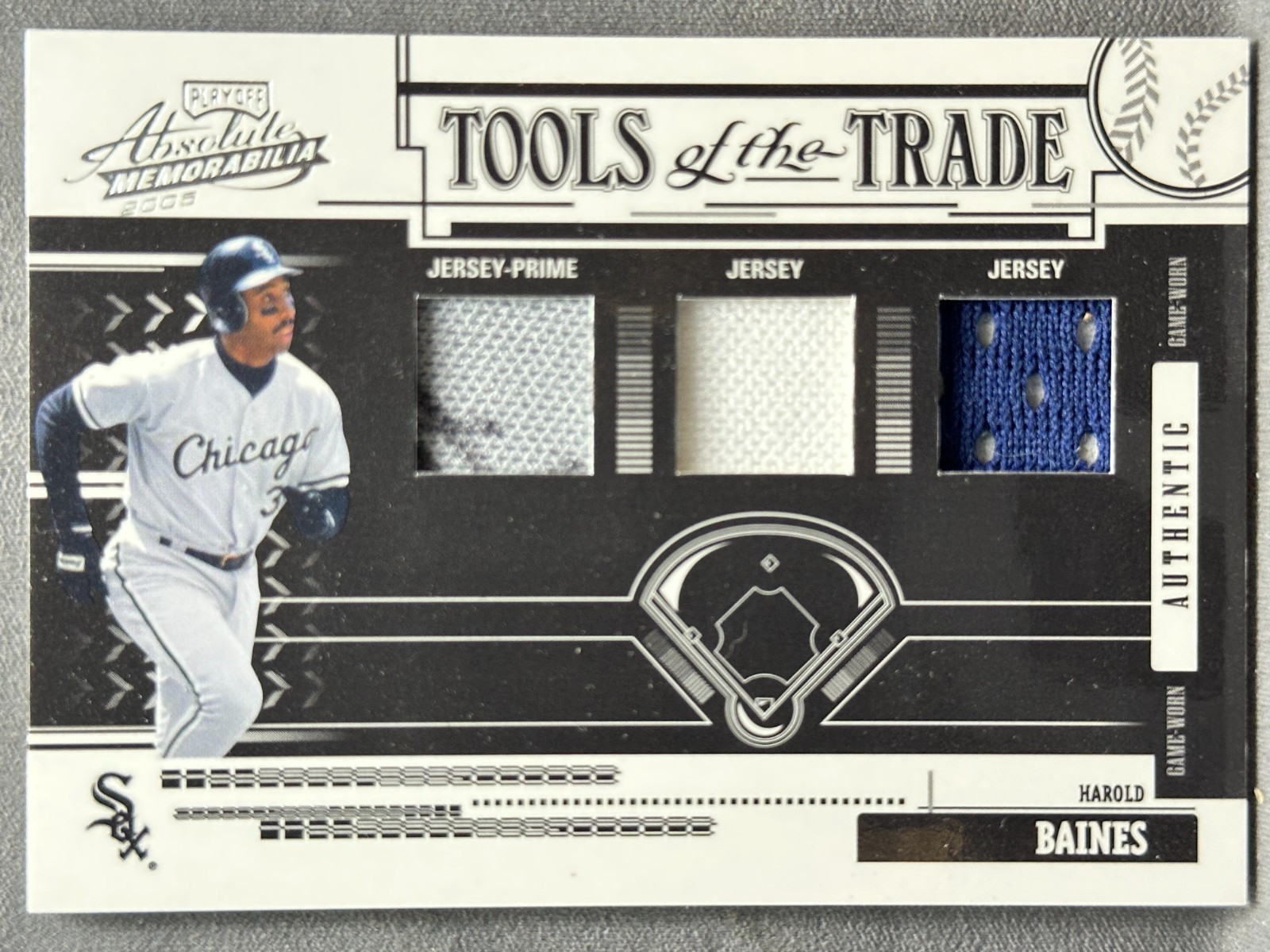 2005 Absolute Memorabilia Tools of the Trade Triple Black Harold Baines /25